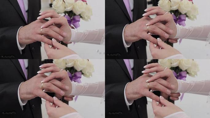 戒指新娘新郎礼服，戒指，特写，婚礼，新娘和新郎的手，浪漫和爱的传统