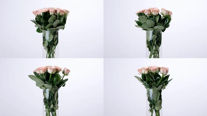 鲜花，花束，白色背景上的旋转，花卉组成由玫瑰卡布奇诺咖啡组成。神圣之美