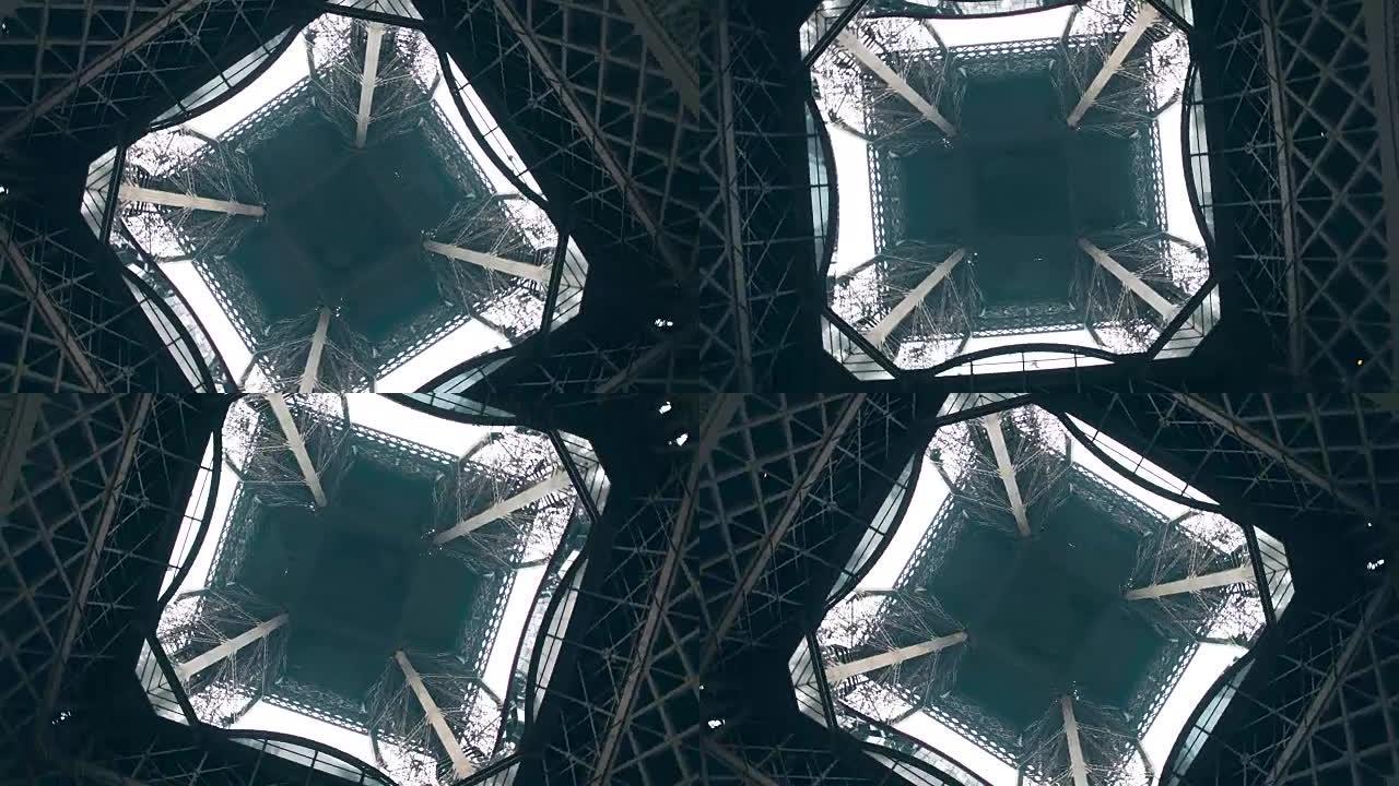 埃菲尔铁塔，从下面看中心。对称性或工程概念。全高清旋转镜头