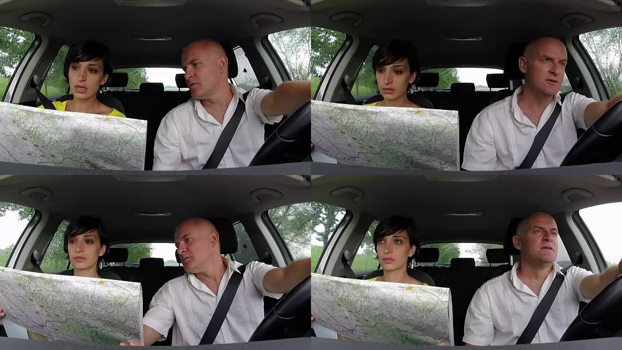 迷失的男人和女人在汽车上使用地图作为方向