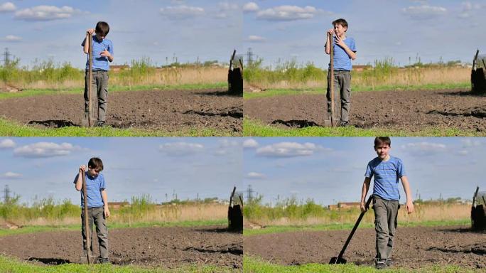 男孩农民疲倦地在干燥的地面上挖旧的脏铲慢动作视频