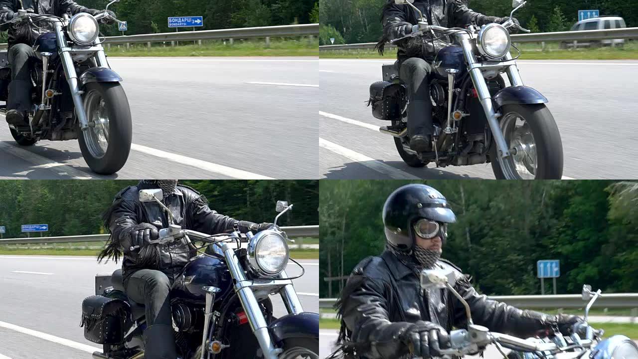 装备中的摩托车手正在高速公路上骑行