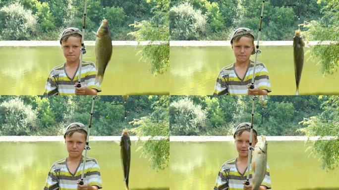 年轻的高加索男孩，有钓鱼竿和鱼