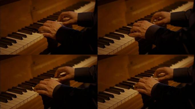 手指在老式钢琴键上关闭