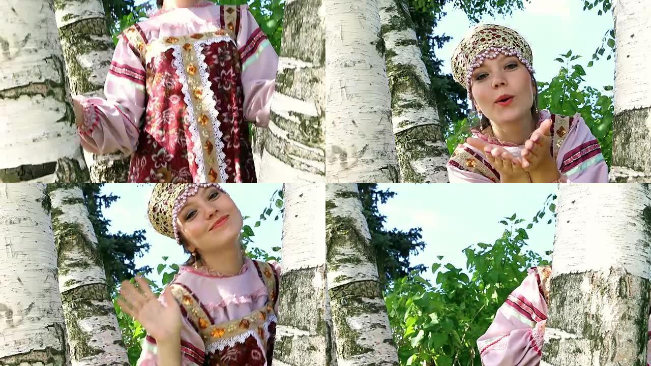 空中用桦木亲吻一个年轻的俄罗斯女孩