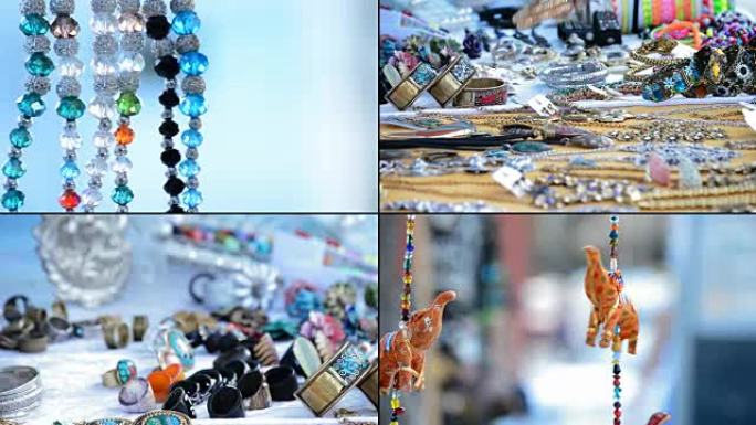 4k工艺摊位贩卖、嬉皮士和部落项链悬挂在摊位贩卖工艺品中，格式为4k