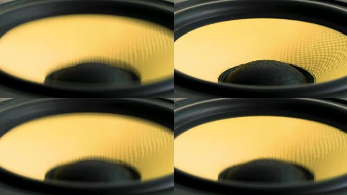 关闭移动低音炮。扬声器部分。薄膜的黑色和黄色。乐器的概念。宏视频拍摄。