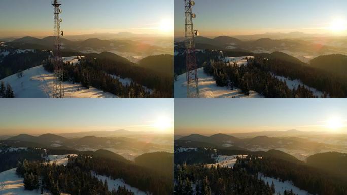 飞越山上的无线电塔，积雪覆盖的冬季景观