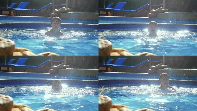 快乐的小孩的慢动作，在游泳池中跳跃和泼水，并带有镜头耀斑效果。1920x1080