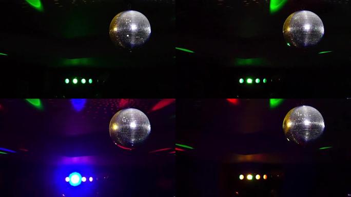 镜球旋转并反射夜店投影机的光线