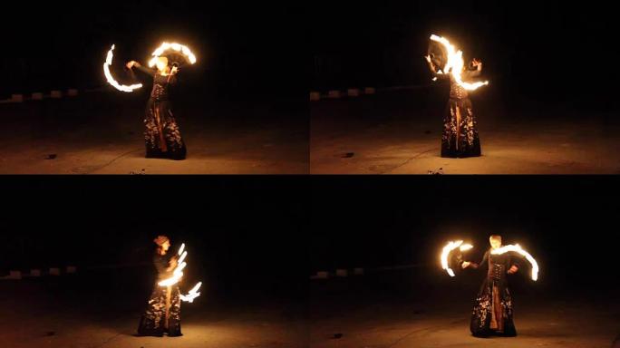 这个女孩用火把展示了一场火表演。