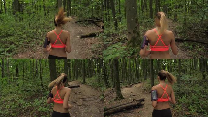 长发的女运动员在森林跑道上奔跑，运动和娱乐