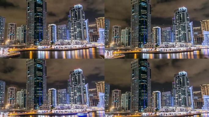 迪拜夜晚时光倒流的迪拜码头塔和运河景观