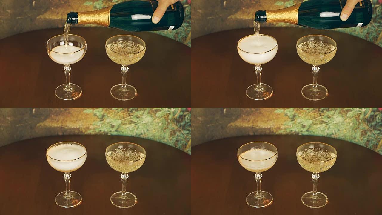 男人用手将金色起泡香槟葡萄酒倒入一对酒杯中。关闭锁定在室内拍摄。