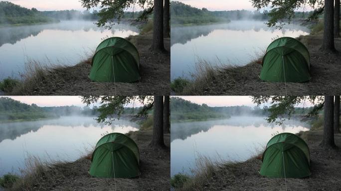 tent on the river bank