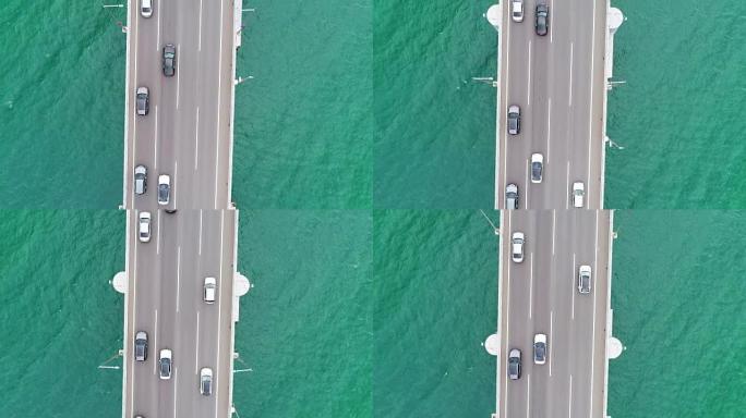 釜山海滩上的广安桥上的汽车航拍。