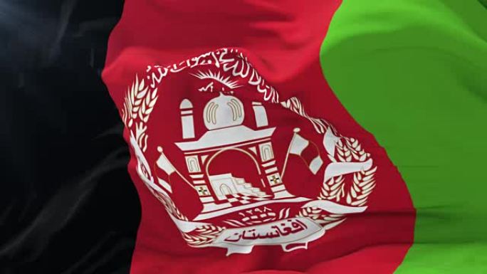 阿富汗国旗在风中缓缓飘扬，随着蓝天盘旋