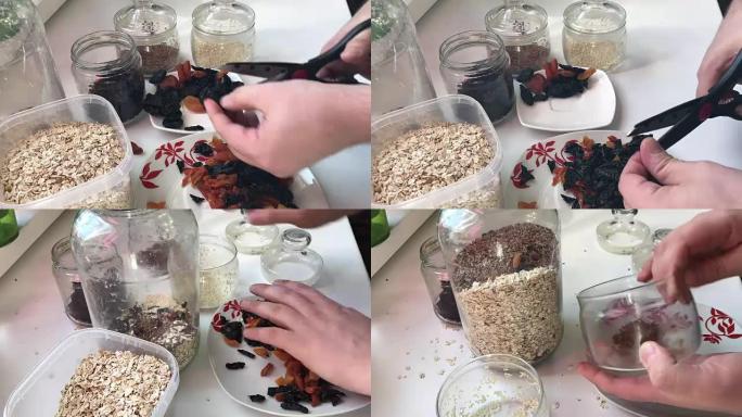 这个人正在准备一种混合的混合。她用剪刀切干果，将其与燕麦片混合，并添加亚麻籽和椰子屑。