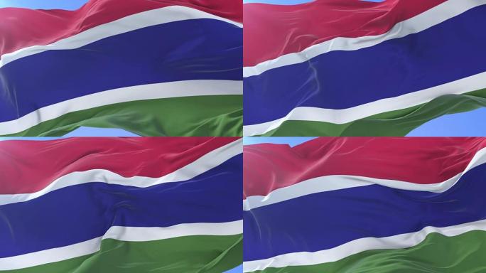 冈比亚国旗在蓝天下缓慢地挥舞着，循环