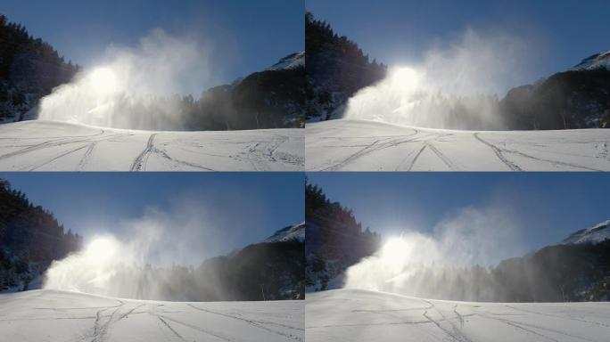 雪炮在雪尘中。造雪是在滑雪斜坡上，通过“雪枪”或“雪炮”迫使水和压缩空气进入制造雪的过程