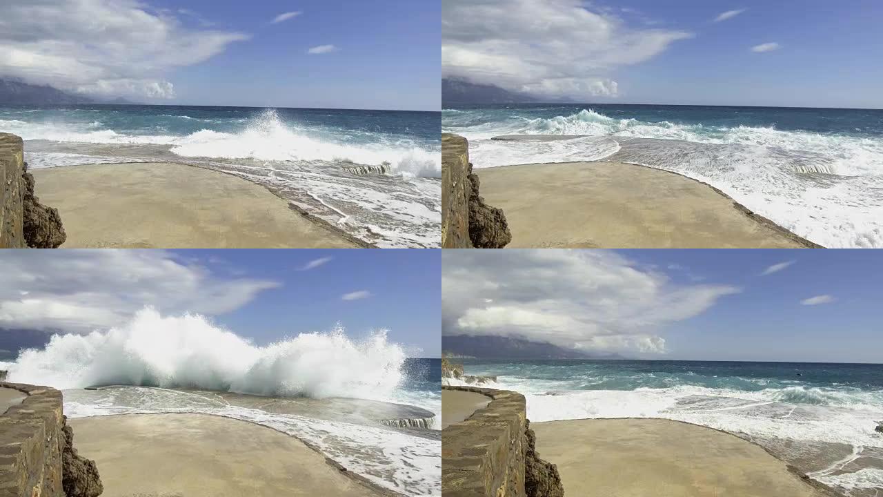 海浪在石墩上断裂