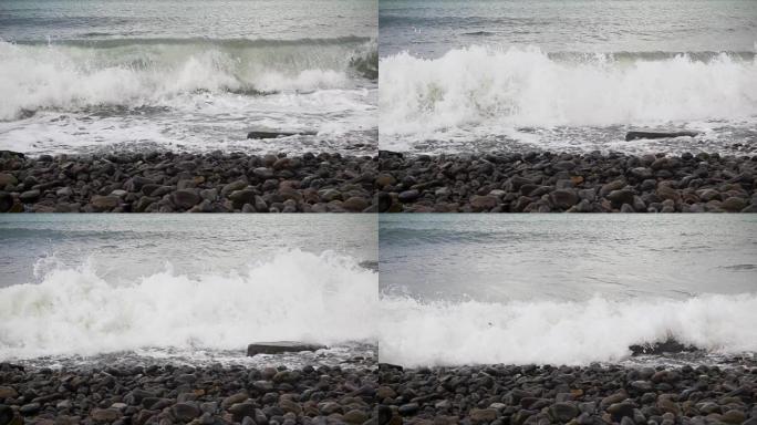 波浪在岩石上破碎缓慢