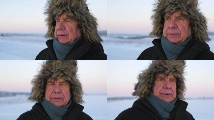 冬季户外夹克和毛帽有皱纹的老人肖像