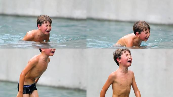 孩子在痛苦中哭泣。孩子在游泳池受到身体伤害后痛苦不堪。小男孩无法控制地哭泣