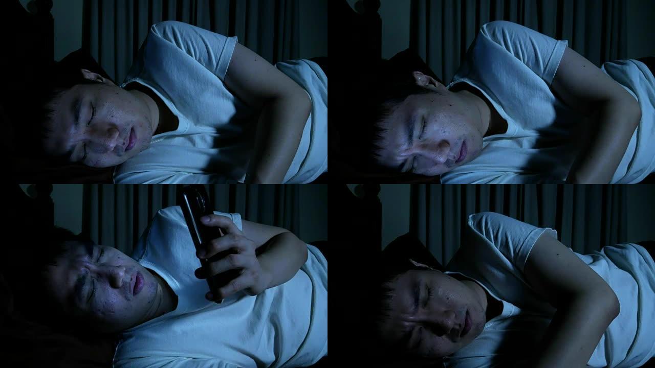 男子睡在床上被手机铃声吵醒