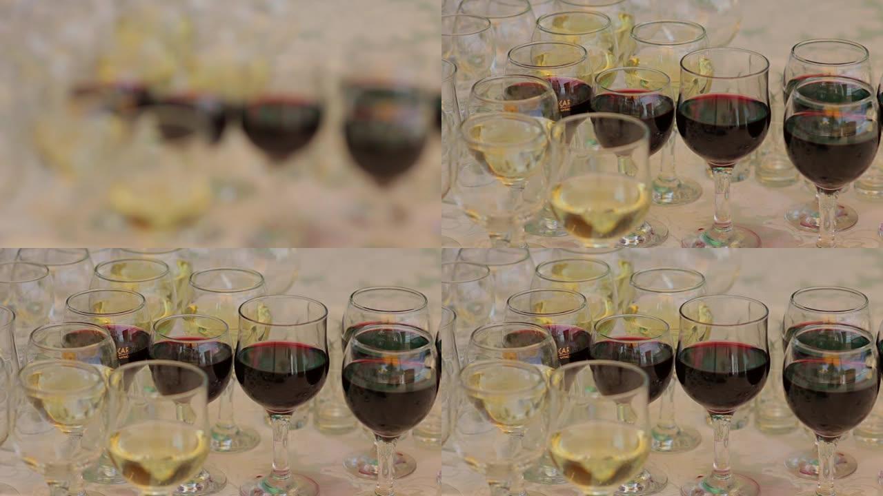 酒杯架中的红酒和白葡萄酒聚焦镜头