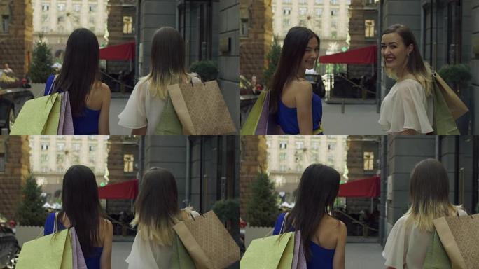购物者妇女在城市街道上回头微笑