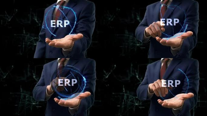 商人在手上展示概念全息图ERP
