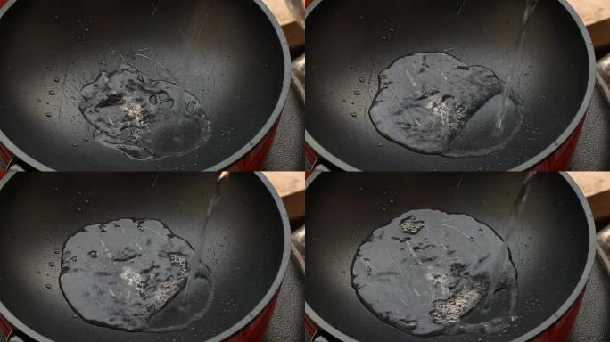 关闭将水倒入锅中煮。