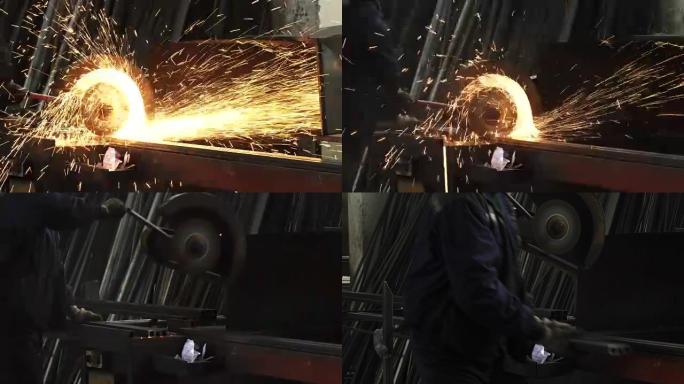 火花飞扬的金属工人焊接钢管的短枪