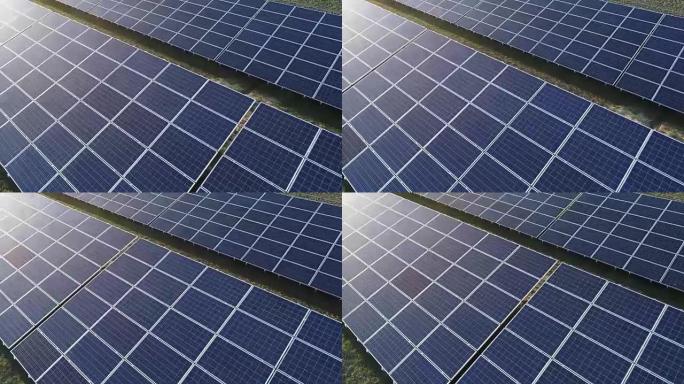 在太阳能农场的太阳能电池板上低空飞行。
