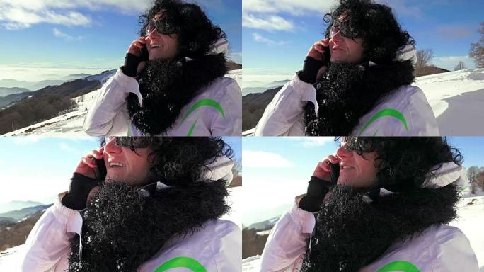 徒步旅行的女人在智能手机上谈论高山雪景，特写镜头。UHD 4k steadycam库存镜头