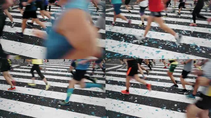 马拉松比赛以五彩纸屑选手开始终点线
