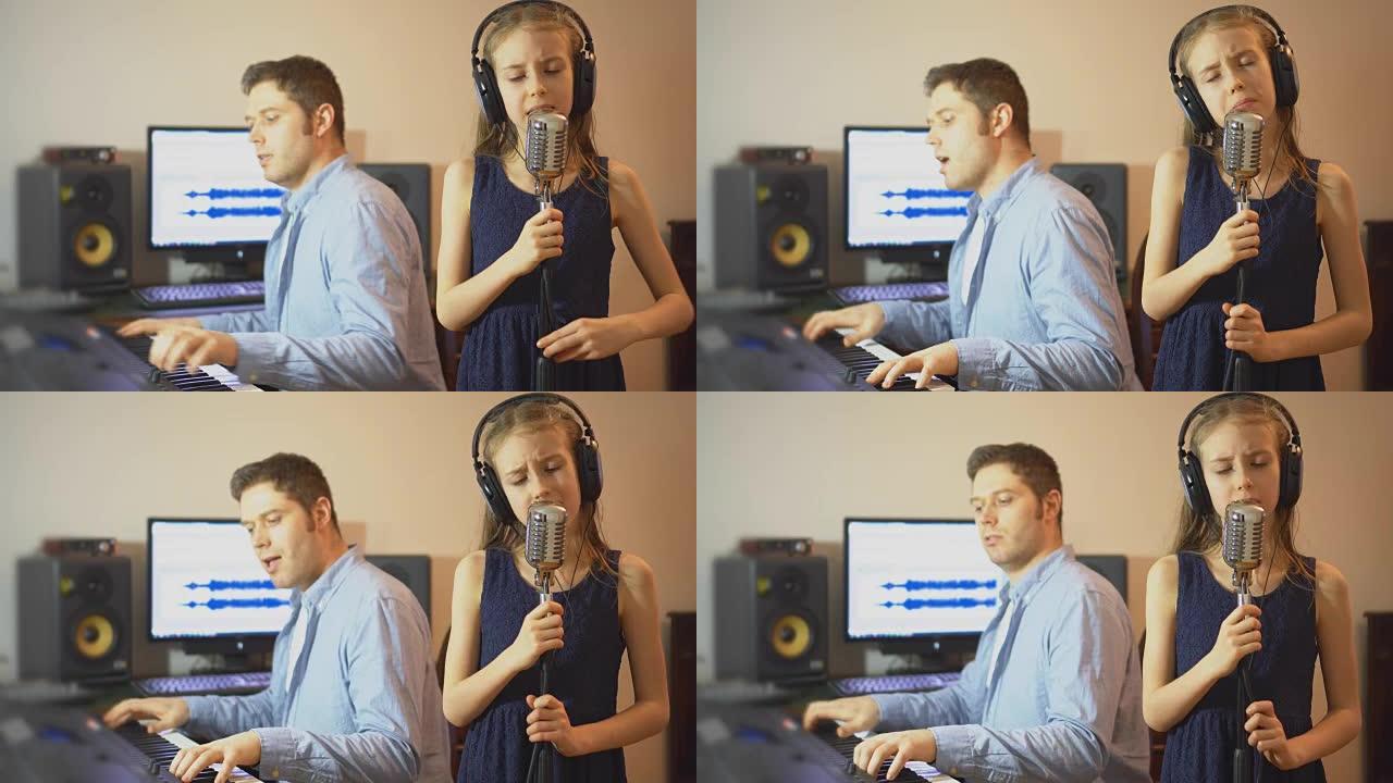 男人和小女孩在音乐工作室排练歌曲。