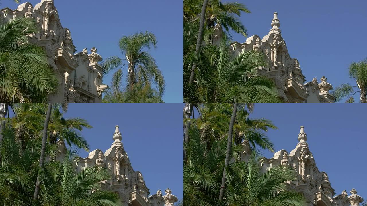 棕榈树和旧建筑倾斜云台拍摄 (高清)