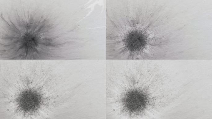 湿纸上的灰色墨水滴