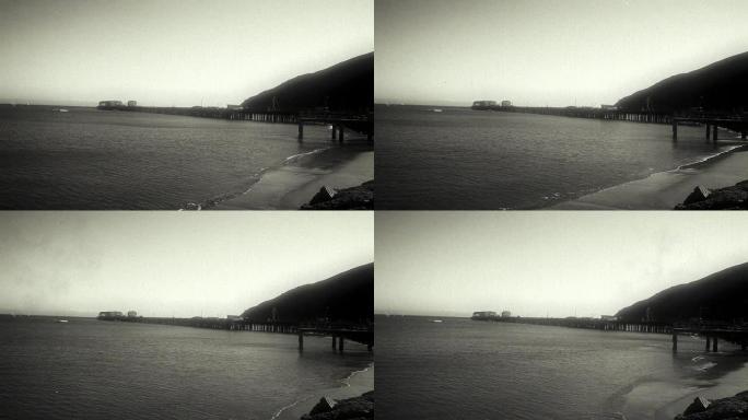 带码头的复古风格海滩场景的宽镜头