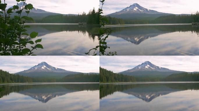 慢动作风景拍摄的一个湖与晨雾，并在日出的背景山