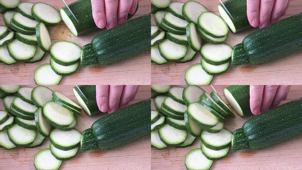 Cut zucchini on chopping board for cooking