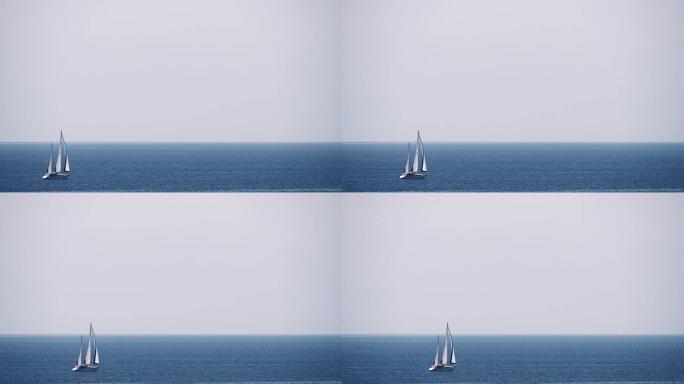 天空、海洋和帆船的场景