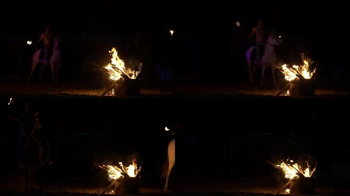 篝火晚会上的牛仔和马剪影