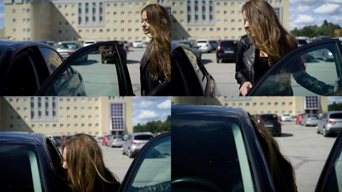 一个美丽严肃的女人在停车场走向她的车的前镜头
