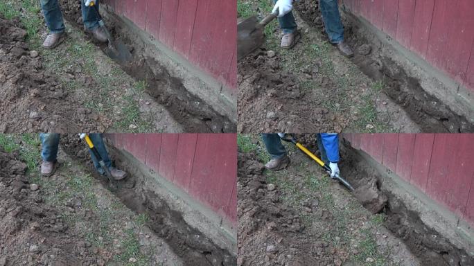 工人在木屋基础附近挖沟