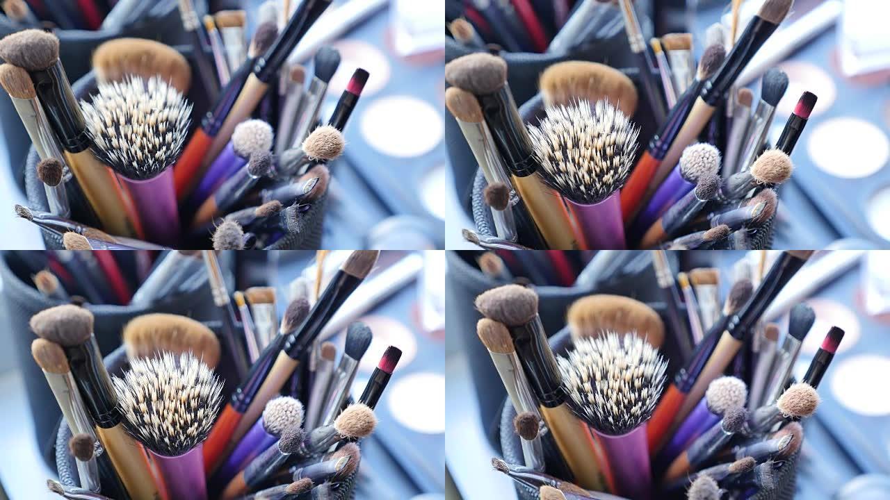 用专业化妆刷化妆桌。Visagiste工具。化妆品用不同刷子