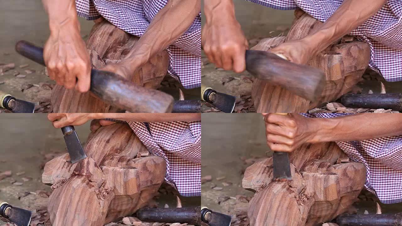 缅甸男子在缅甸蒲甘为游客制作木制纪念品