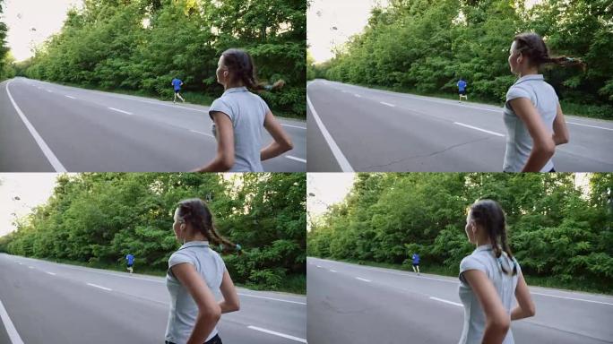 在乡村的开阔道路上奔跑的男人和女人